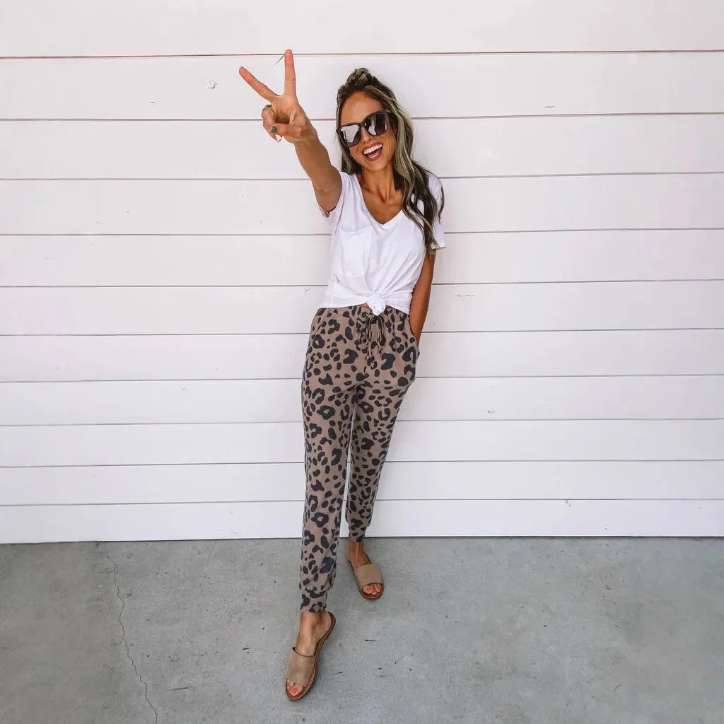 Women's polyester pencil leggings with leopard print irregular colour-block pattern, mid-rise elastic waist