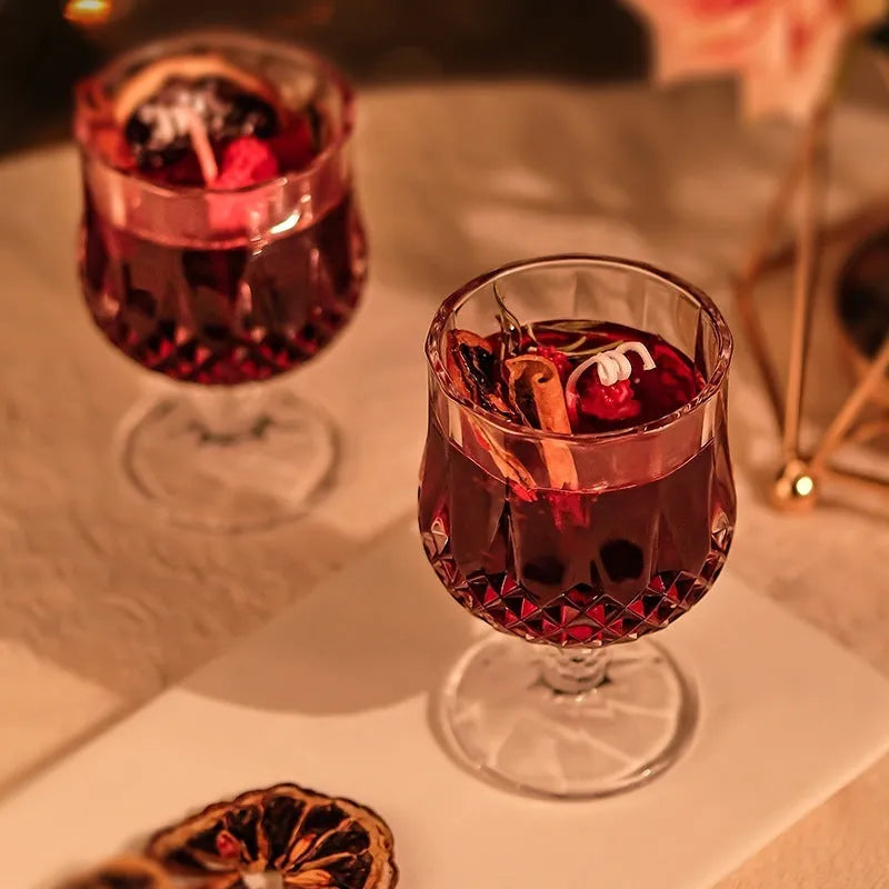 Scented candle in a glass wine goblet with translucent jelly crystal wax and French mulled wine label.