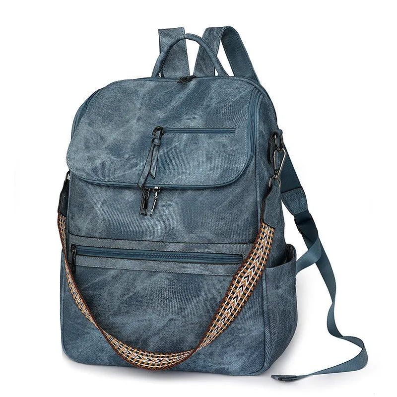 Retro college student backpack with curved shoulder straps in six colour options including black, blue and brown variations