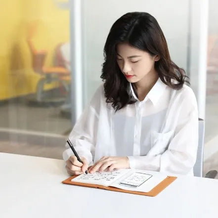 Huion Note X10 smart digital book business meeting notepad in Elk Brown with PW320 pen and USB-C cable