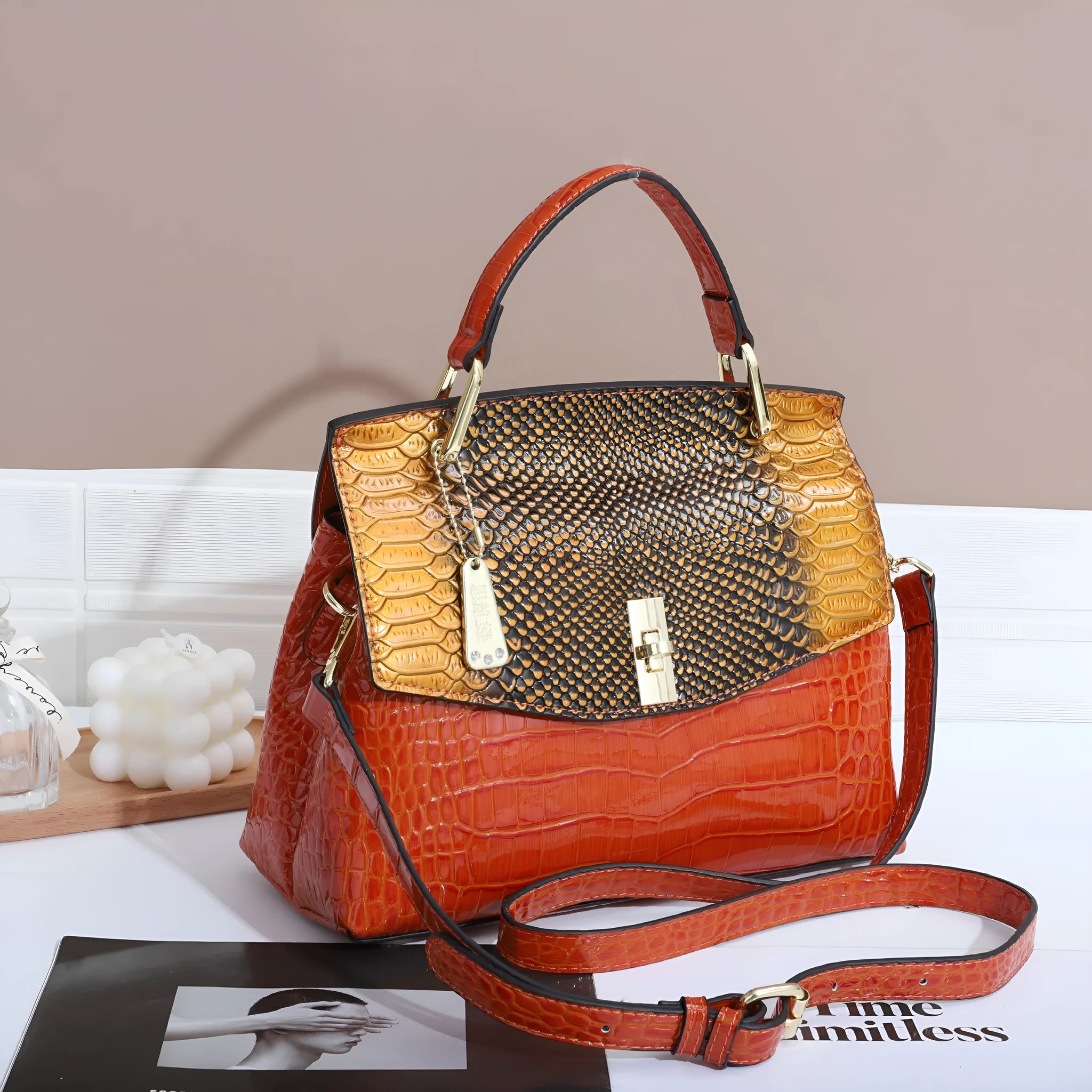 Women's structured crossbody handbag in colourful crocodile pattern with double shoulder straps and organisational compartments