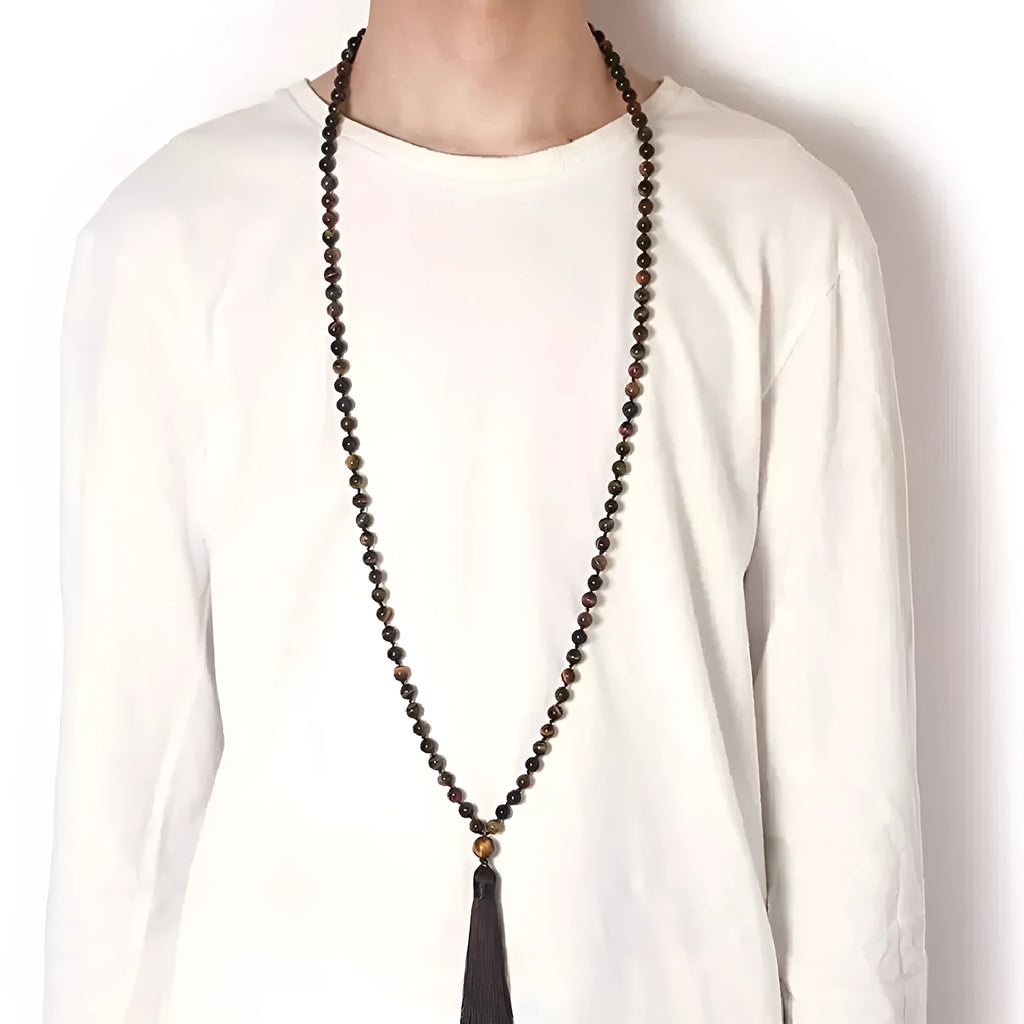 Long handmade agate and gemstone tassel necklace with amethyst, lapis lazuli, and blue stones.
