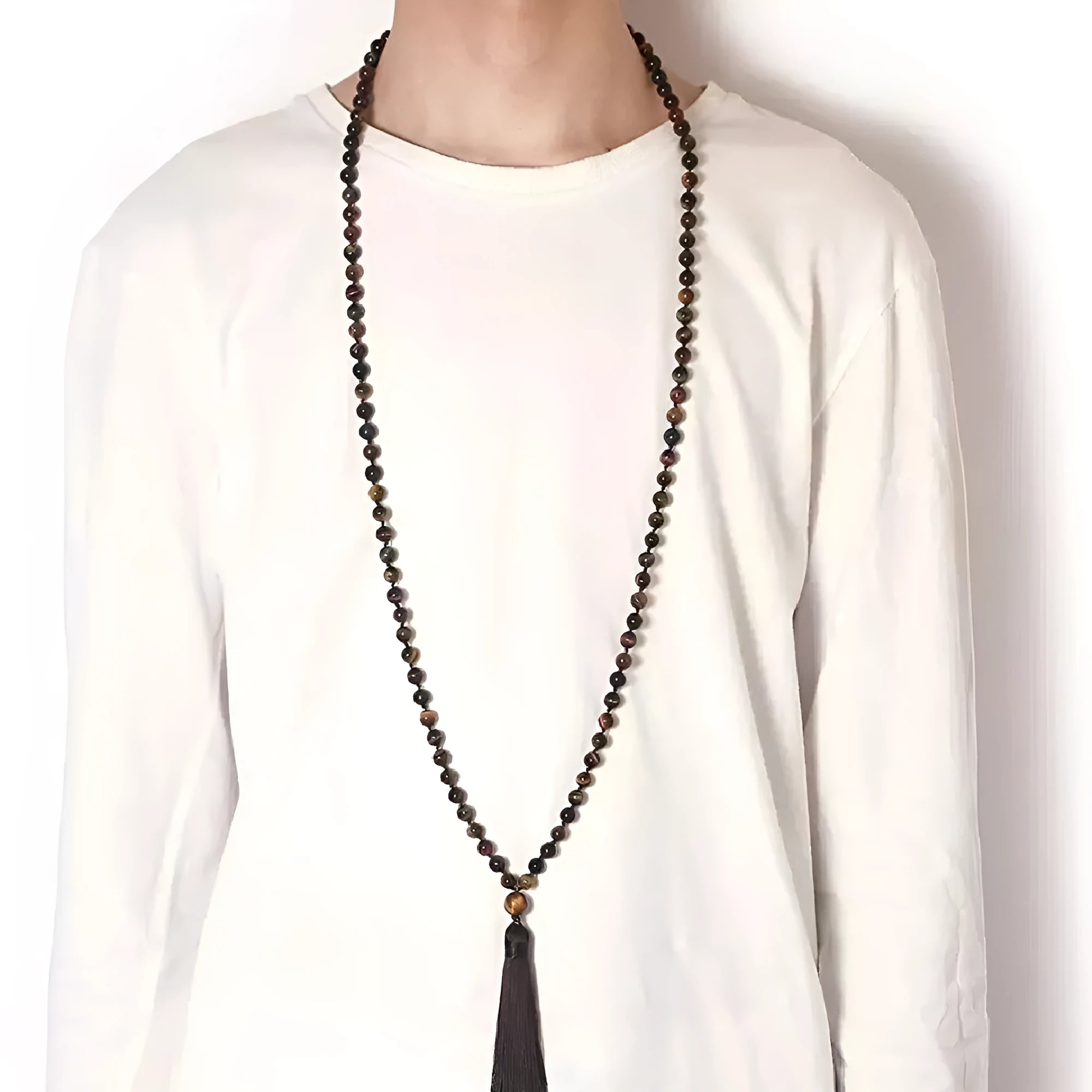 Long handmade agate and gemstone tassel necklace with amethyst, lapis lazuli, and blue stones.