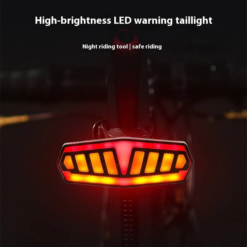 Wireless remote control waterproof bicycle taillight with turn signals on a bike seat post.
