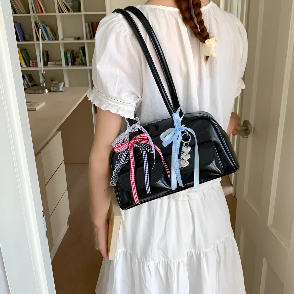 Niche single shoulder bag for women with pillow shape and welt pocket in Black