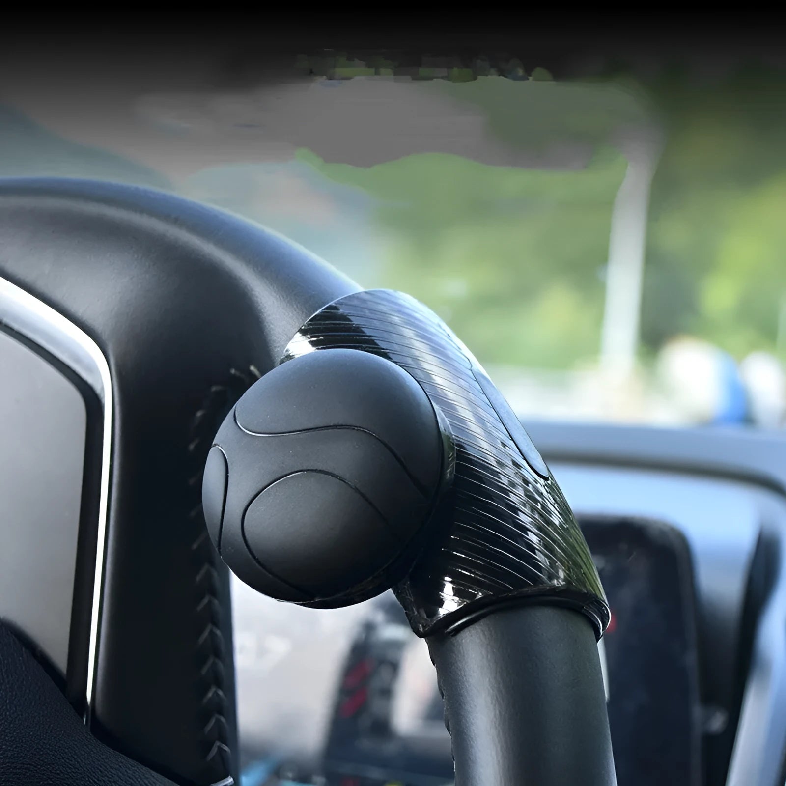 Steering wheel assist ball with silicone grip and metal bearing booster for single-handed steering