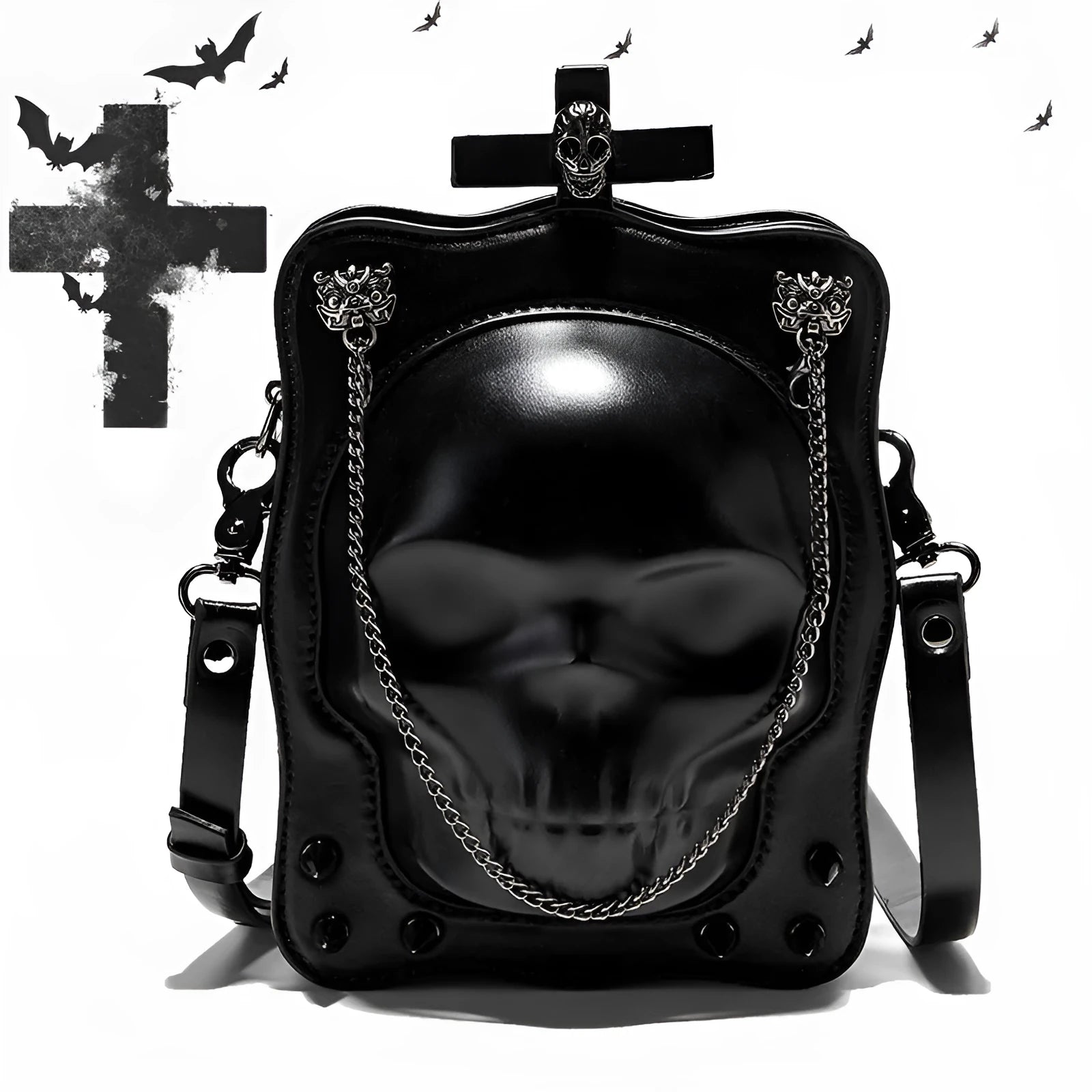 Black vertical square mini crossbody bag with embossed skull design, metal rivets, and chain strap.