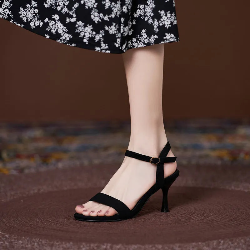 Women's round toe suede sandals with simple high heel strap, black colour, side view