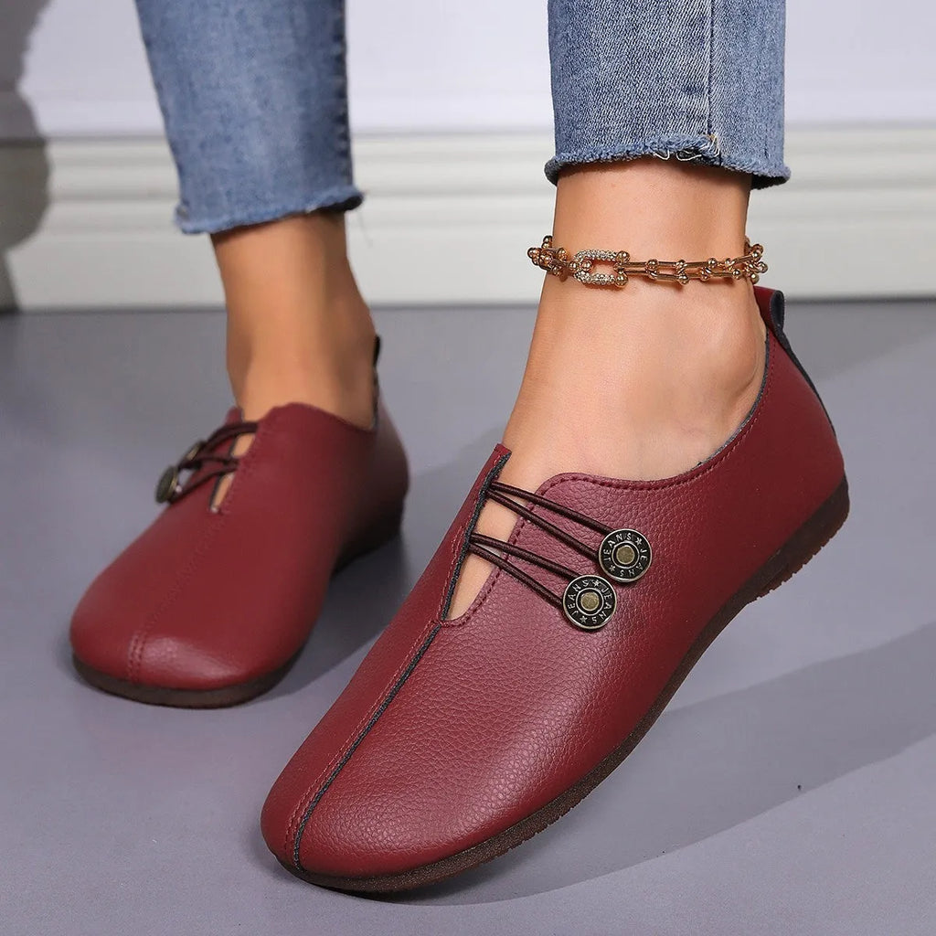 Women casual slip-on button loafers in beige with round toe and low top artificial PU upper