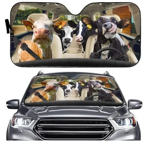 Telescopic aluminium foil car sun shield extended across a car windscreen