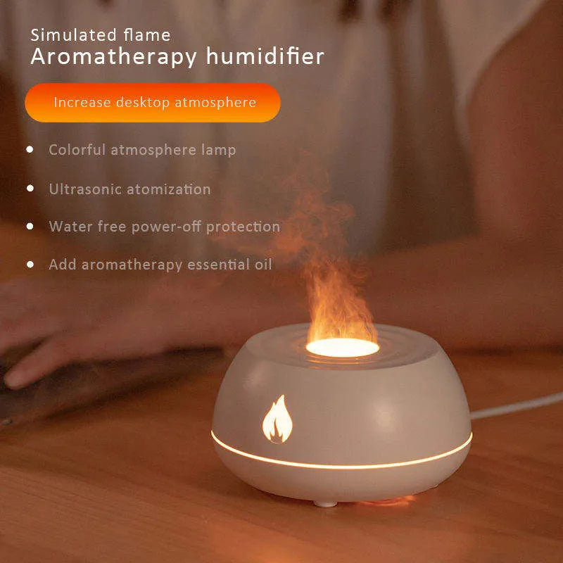 Black and white USB humidifier diffuser with glowing flame effect light on a wooden table.