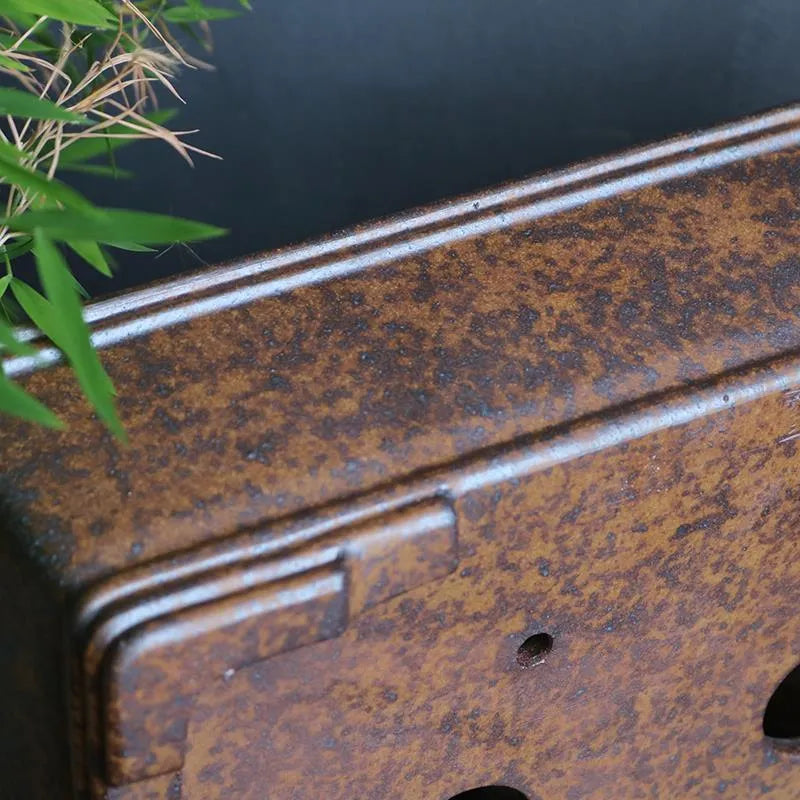 Rectangular purple sand bonsai pot with five-line textured pattern, shown empty on a wooden surface.
