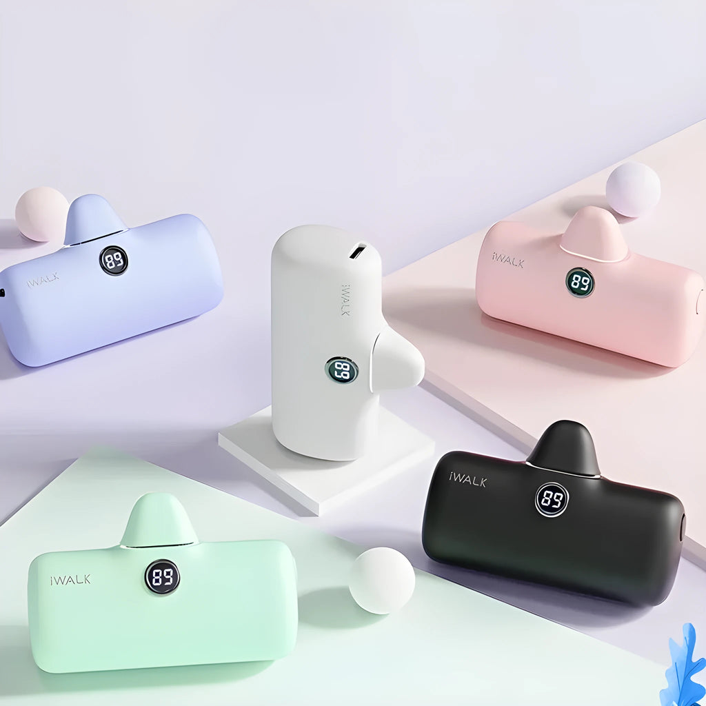 Compact cylindrical lipstick-shaped power bank showing digital battery percentage screen, in choice of colours.