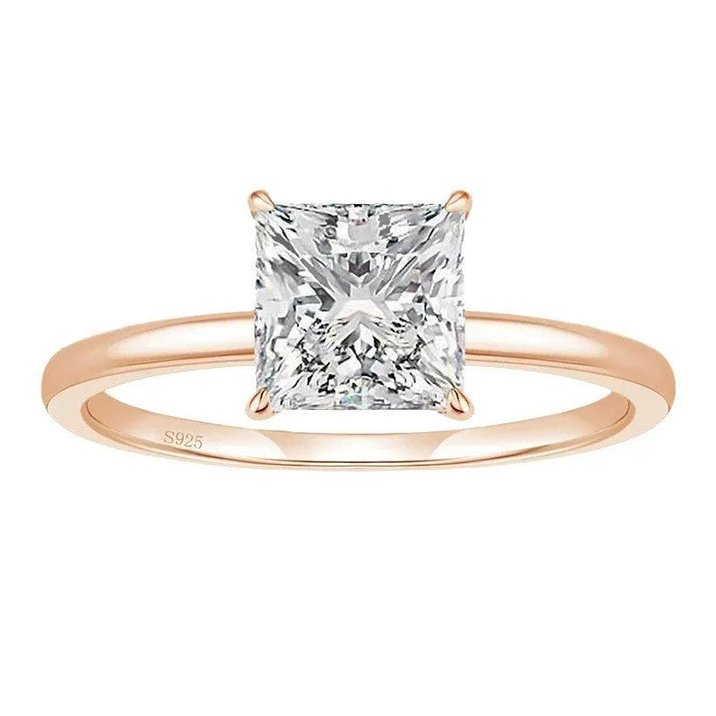 A simple geometric women's ring in 925 silver, shown in silver, gold, and rose gold colour options on a size chart.