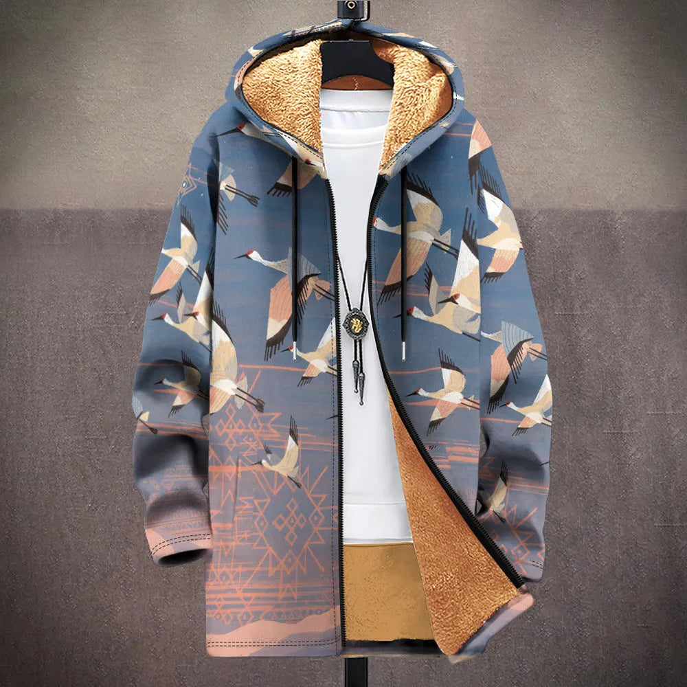 Man wearing a loose-fit, zip-up hooded cardigan with a multicolour digital print pattern.
