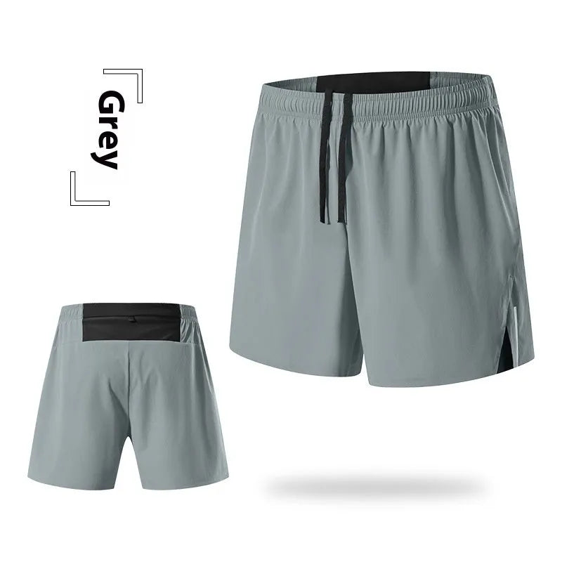 Men's loose-fit off-road running shorts in grey, showing high-waist design and built-in lining.