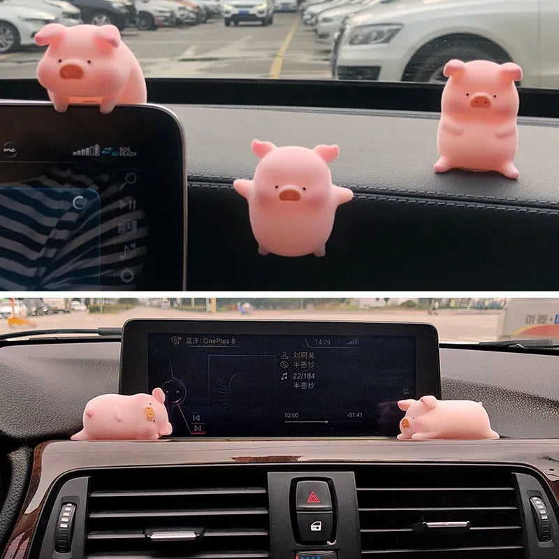 Glossy resin cartoon pig ornament for car dashboard decoration, shown in one of eight available character styles.