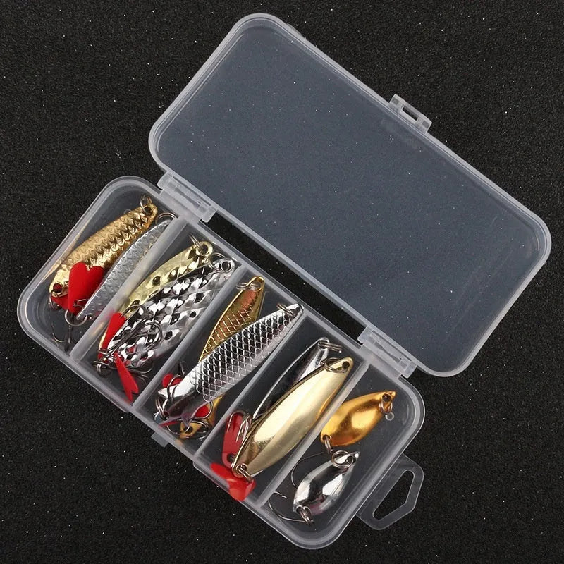 Metal pineapple-shaped fishing lure with sequin attachments in gold and silver colours
