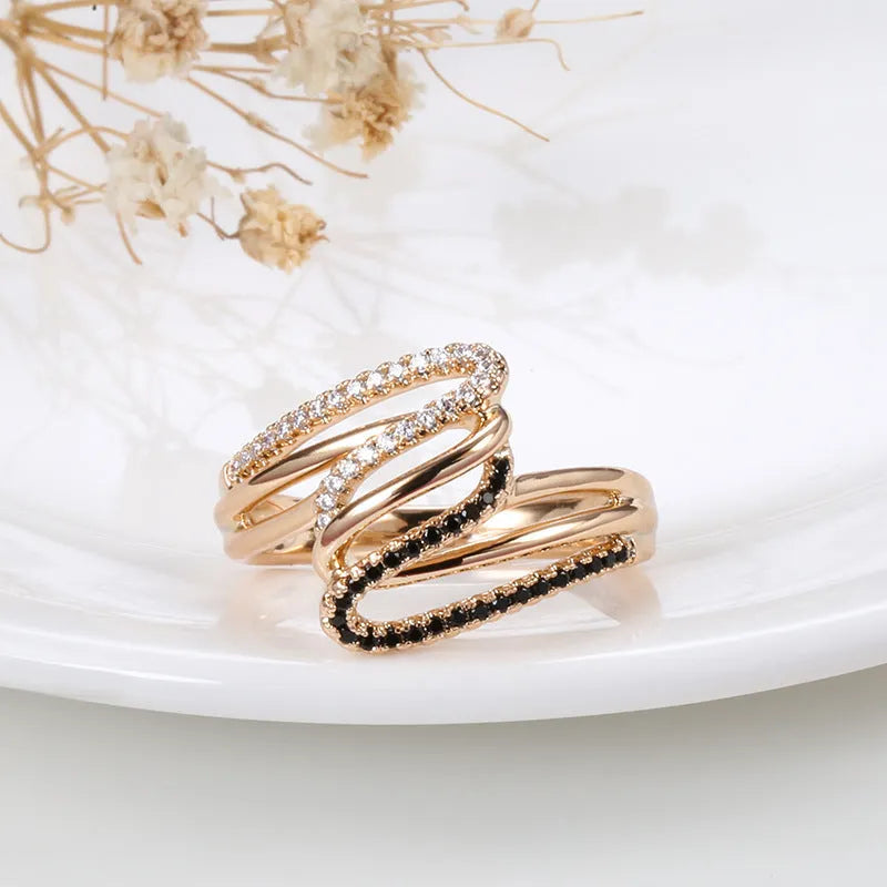 Women's copper ring with micro-inlaid zircon details in colour WK2230, shown on a hand.