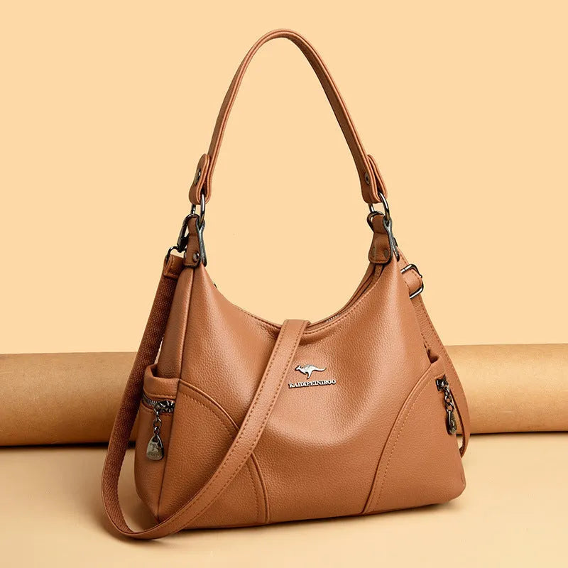 Women's PU messenger bag in beige with single shoulder strap and horizontal square shape