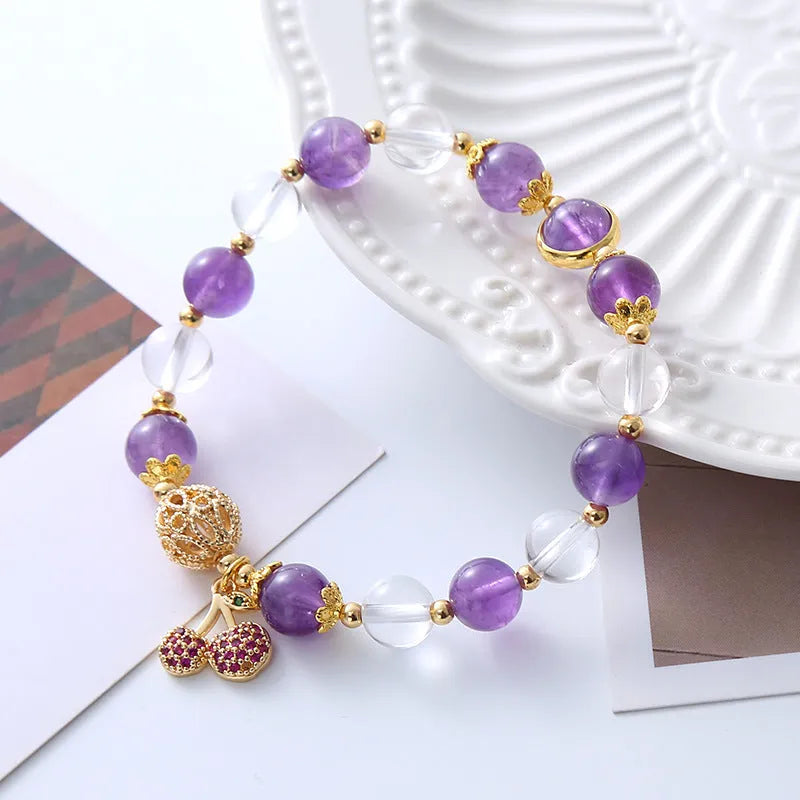 Purple crystal women's bracelet with micro-inlaid cherry blossom design in amethyst colour tones.
