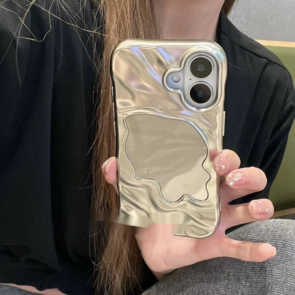 Solid colour iPhone case with a mirror back showing a water ripple pattern, displayed in beige, blue, and purple colour options.