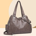Soft PU leather women's tote bag in a square-vertical shape with a single shoulder strap.