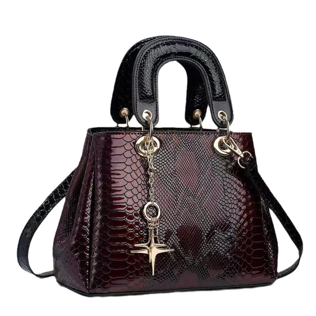 Women's PU shoulder messenger bag with crocodile pattern, zip closure, hidden pocket, 26x12x18cm, in black, green, red or silver.