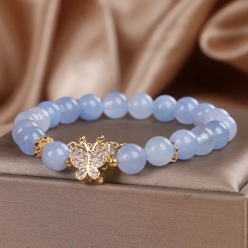 Sky blue aquamarine butterfly crystal bracelet with pearls and rhinestones measuring 17cm length