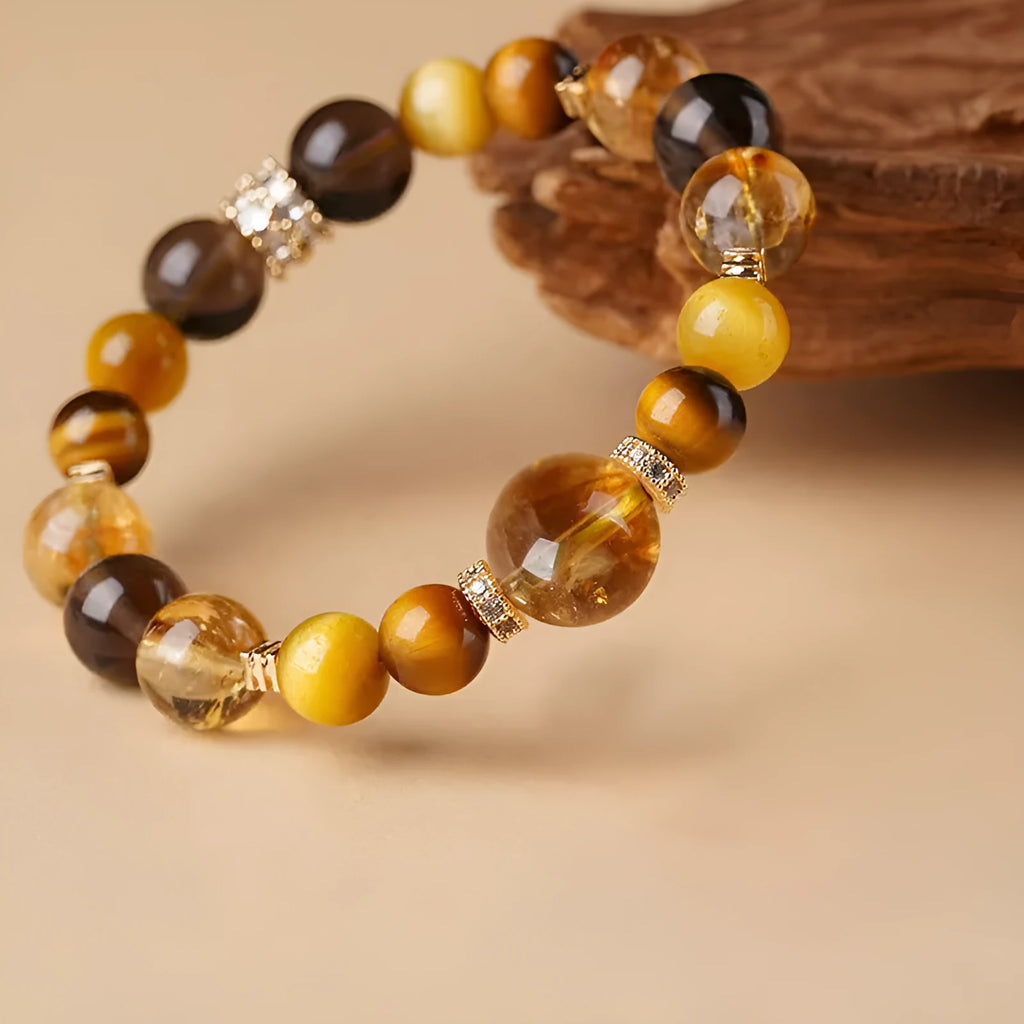 Crystal tiger-eye bracelet with yellow tower design showing 10mm geometric beads