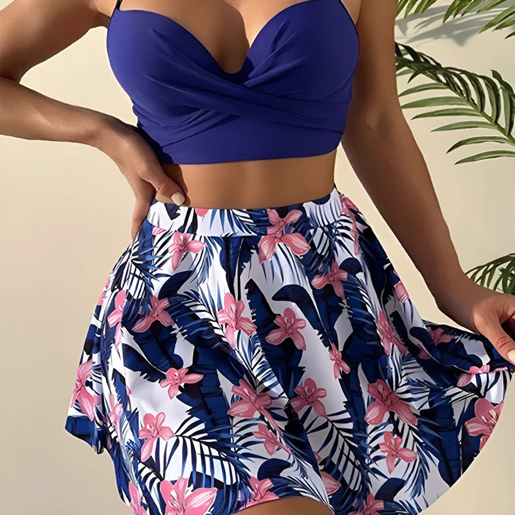 Women's high-waist bikini three-piece swimsuit in polyester fabric showing belly coverage design