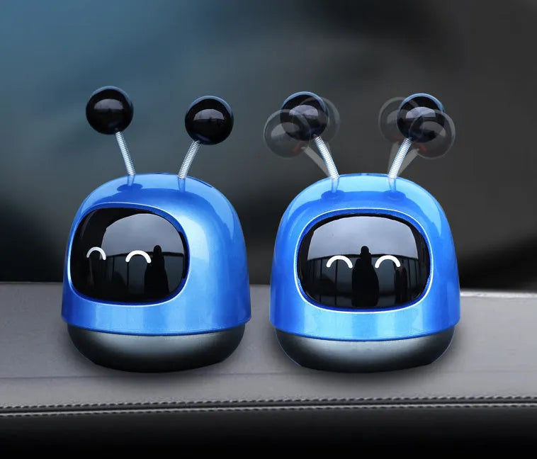 Creative robot car vent aromatherapy decoration with gel diffuser in blue, grey, or red.