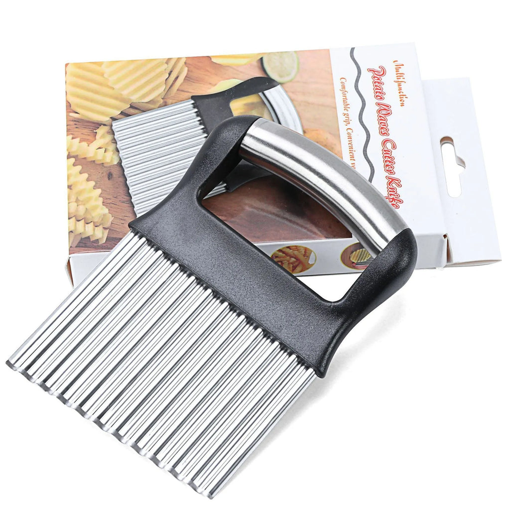 Stainless steel potato wave knife with a wavy blade on a wooden cutting board next to a potato.