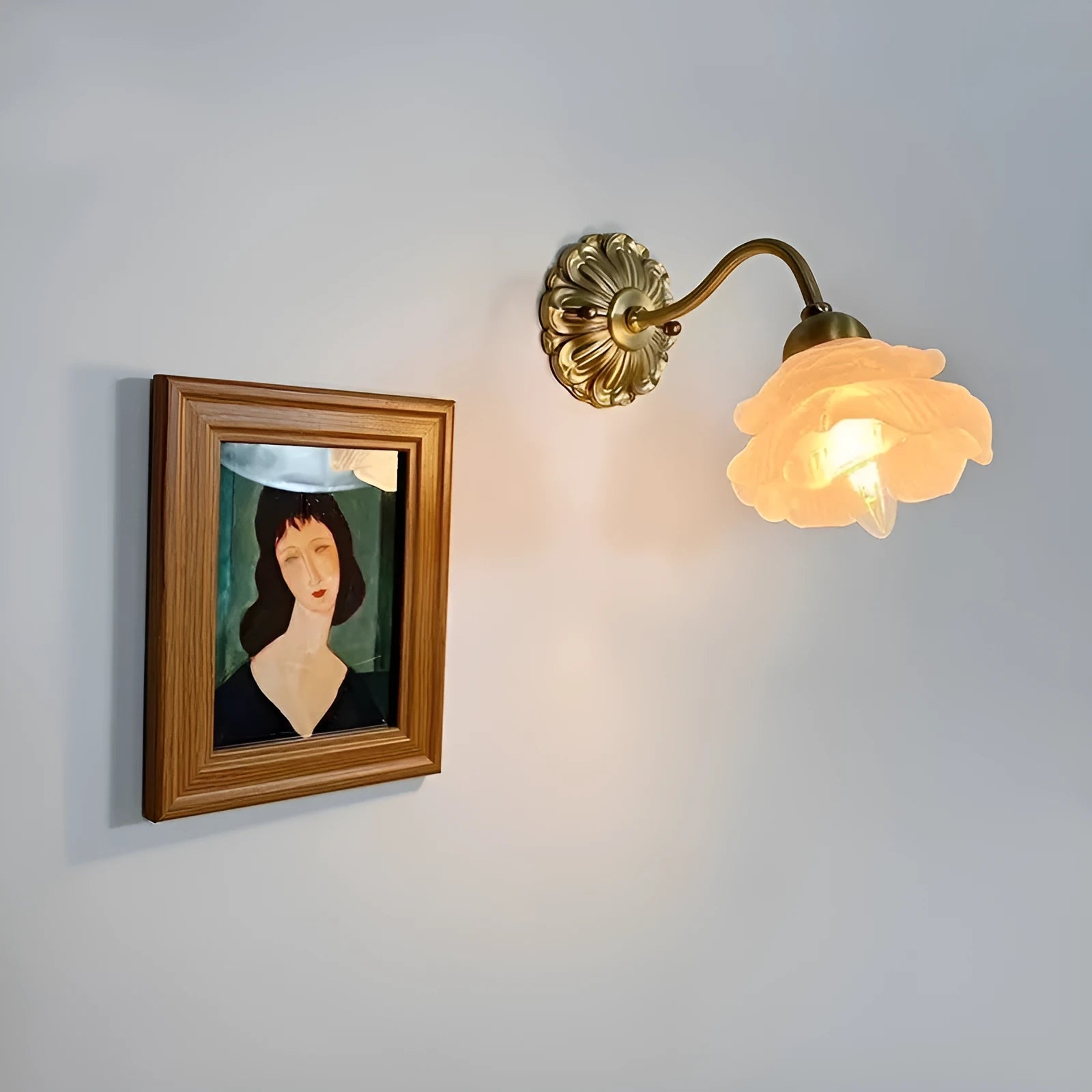Retro copper wall lamp with frosted glass shade and warm LED light mounted on a bedroom wall