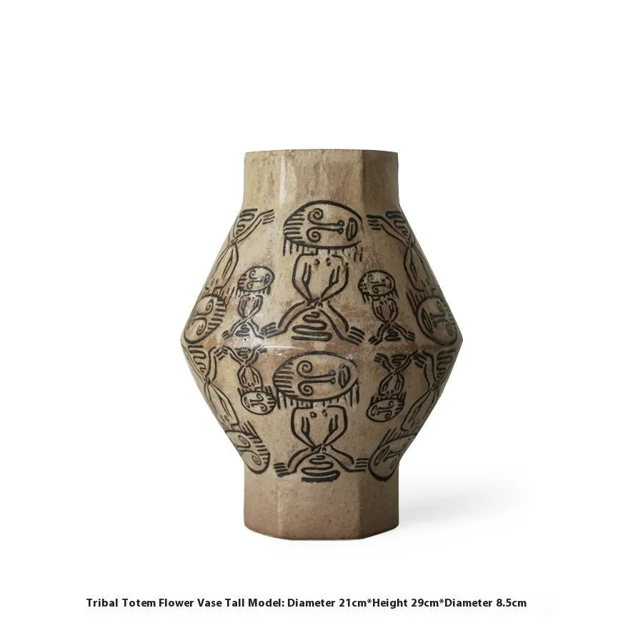 Hand-painted ceramic vase with tribal totem patterns in cylindrical shape