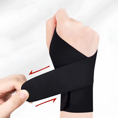Adjustable black athletic wristguard shown on a wrist, suitable for sports like badminton and tennis.
