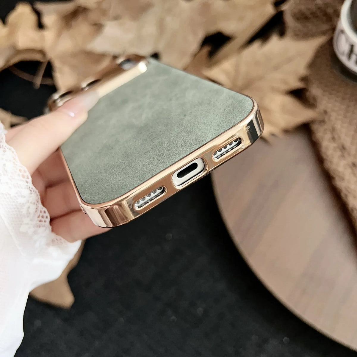 Electroplated phone case with metal frame and lambskin back in classic black for iPhone