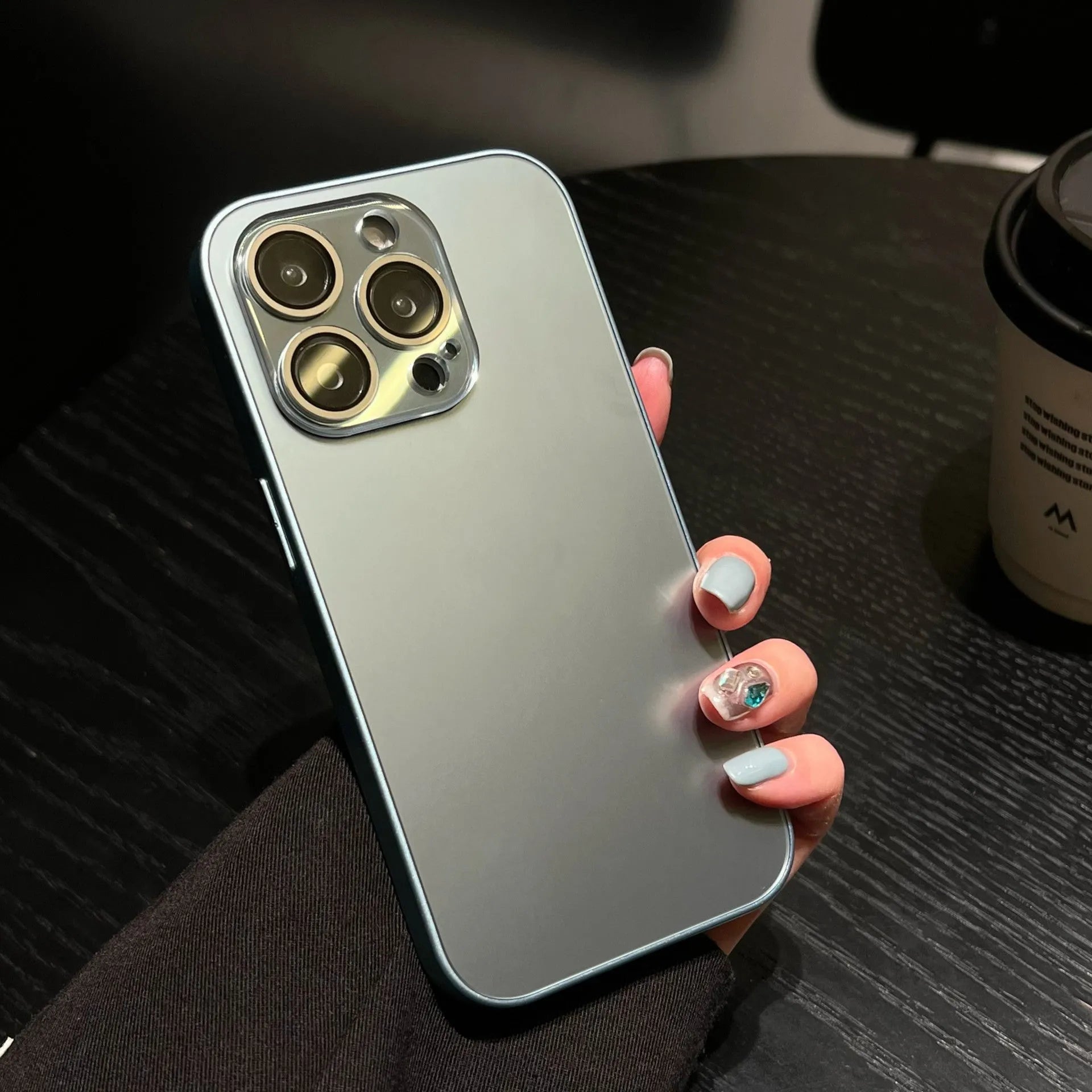 iPhone 15 Pro Max frosted PC phone case in shiny black with all-inclusive design and glass lens protector