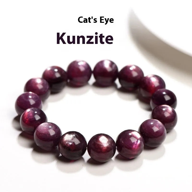 Natural purple lepidolite crystal round bead bracelet with adjustable cord on a wooden surface.