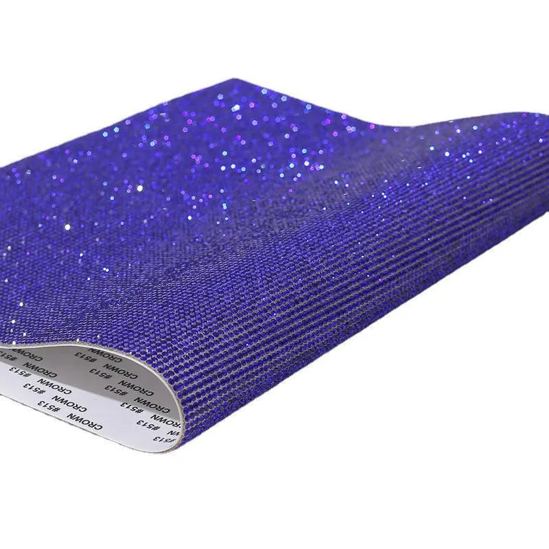 Sheet of rhinestones on net backing with hot drill glue, showing multiple colour options including AB and rose gold.