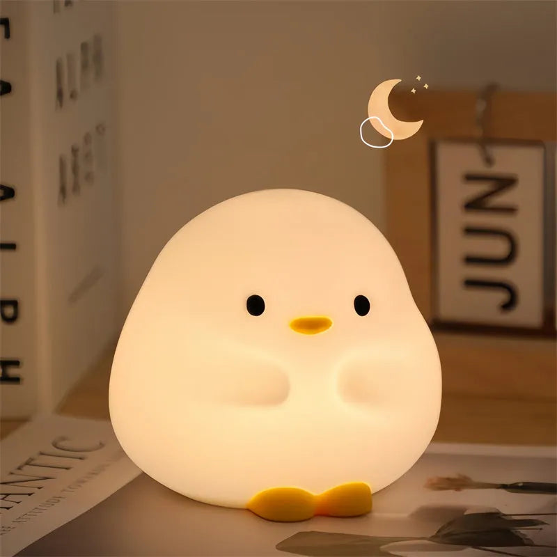 Cute duck LED night lamp in silicone with USB charging, touch sensor, and 125mm x 105mm x 110mm size