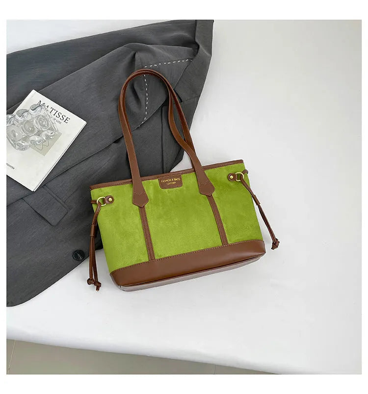 PU leather shoulder bag in black, horizontal square shape with double shoulder straps and sewing line detailing