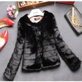 Women's short-length faux fur knitted top in beige, shown front-on.