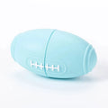Blue silicone rugby ball dog toy with treat-dispensing centre for chewing and fetching