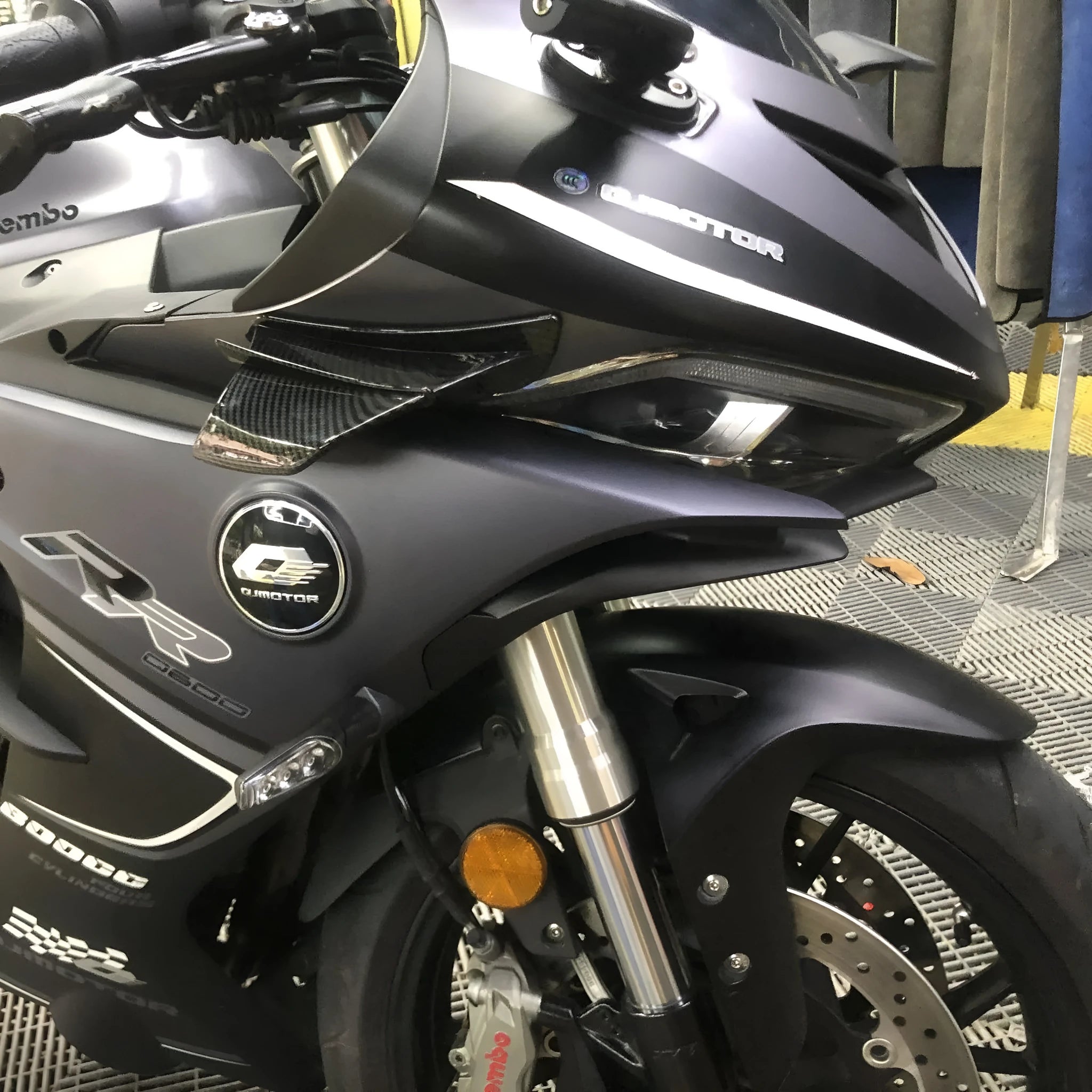 Universal motorcycle spoiler wing accessory for air diversion in 18x8cm size with multiple pattern options