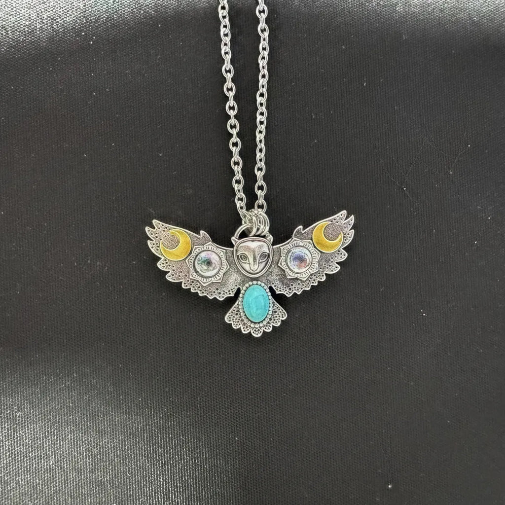 Silver electroplated alloy necklace with owl, moon, and flower pendant on unisex chain