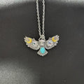 Silver electroplated alloy necklace with owl, moon, and flower pendant on unisex chain