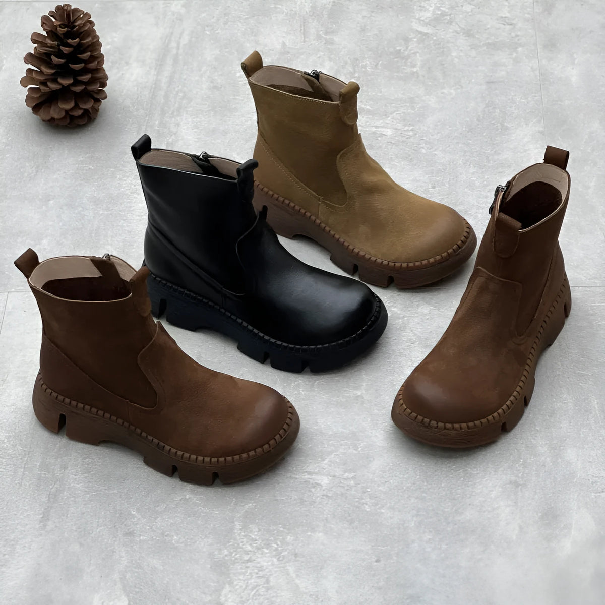 Women's round toe mid heel leather boots in brown with side zipper and rubber sole