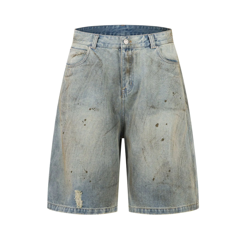 Blue cropped denim trousers with a straight leg and zip fly on a hanger