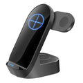 Black grey foldable 3-in-1 wireless charging stand with phone upright, watch and earbuds on pads.